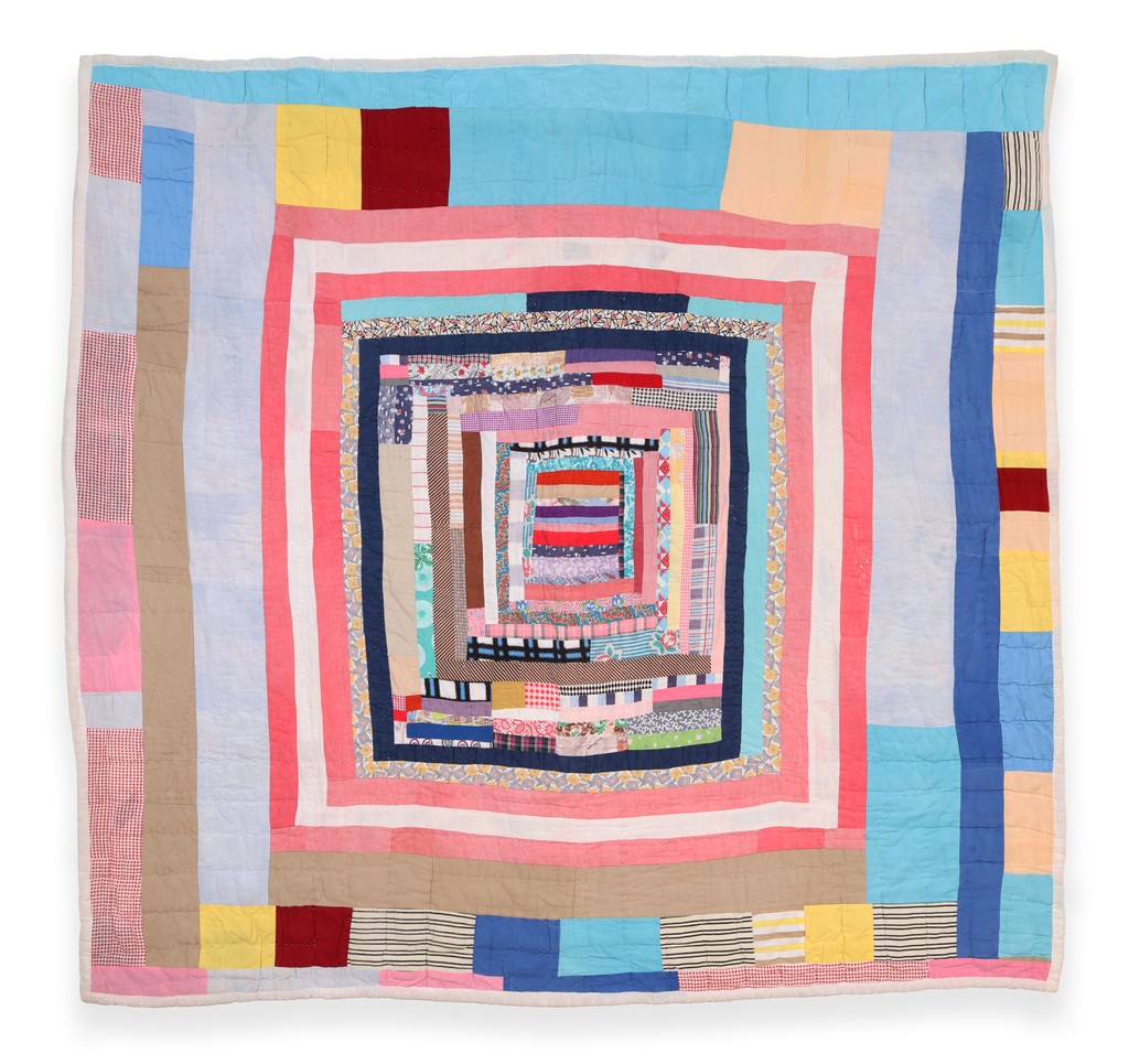 Housetop pattern quilt using spring colors - pink, yellow and sky blue.